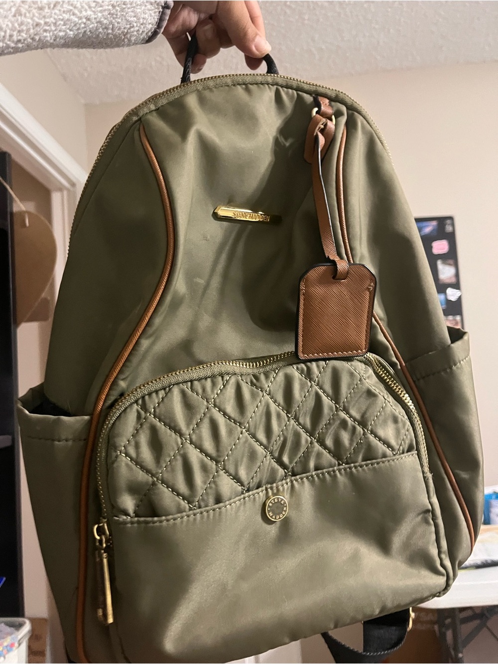 Olive Green Quilted Backpack with Brown Trim Steve Madden